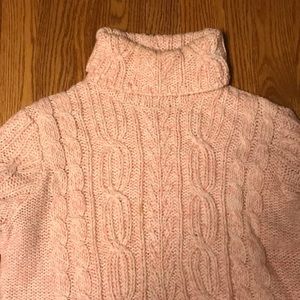 Light pink turtleneck cable knit sweater